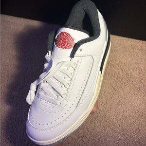 Jordan White and Black Sneakers with Red Logo